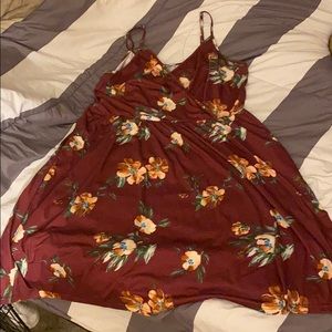 Brand new knee length dress. Maroon floral print